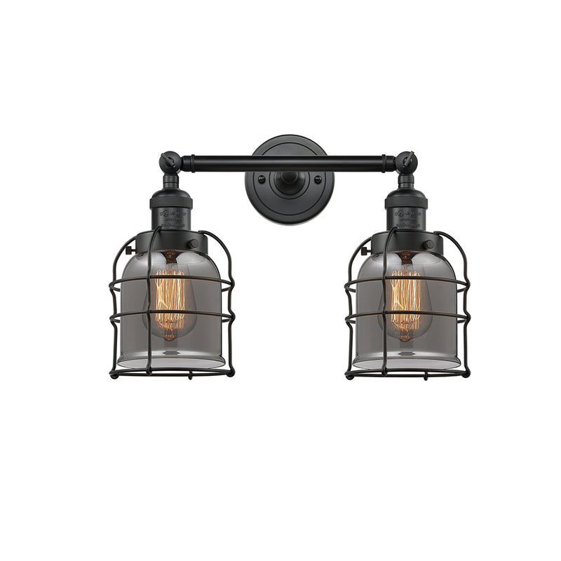 Bell Cage Bath Vanity Light shown in the Matte Black finish with a Plated Smoke shade